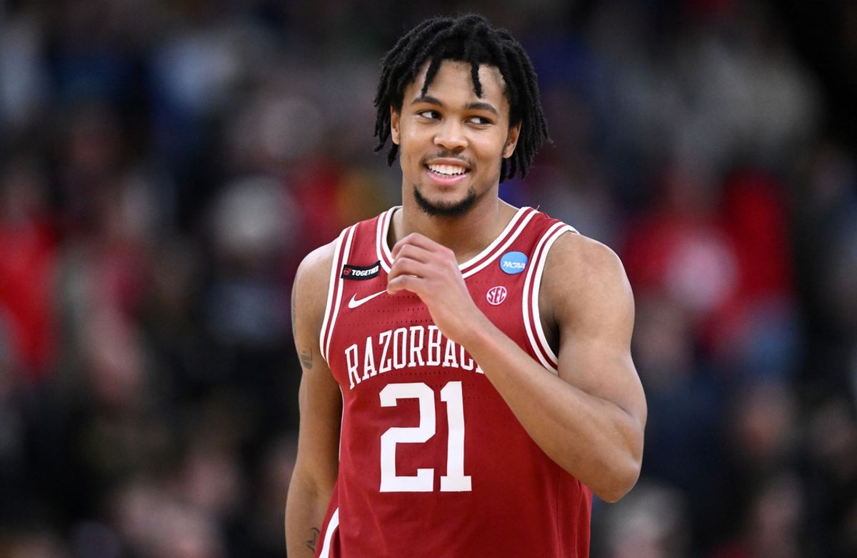 Mar 22, 2025; Providence, RI, USA; Arkansas Razorbacks guard D.J. Wagner (21) celebrates during the second half of a second round men’s NCAA Tournament game against the St. John's Red Storm at Amica Mutual Pavilion. Mandatory Credit: Brian Fluharty-Imagn Images