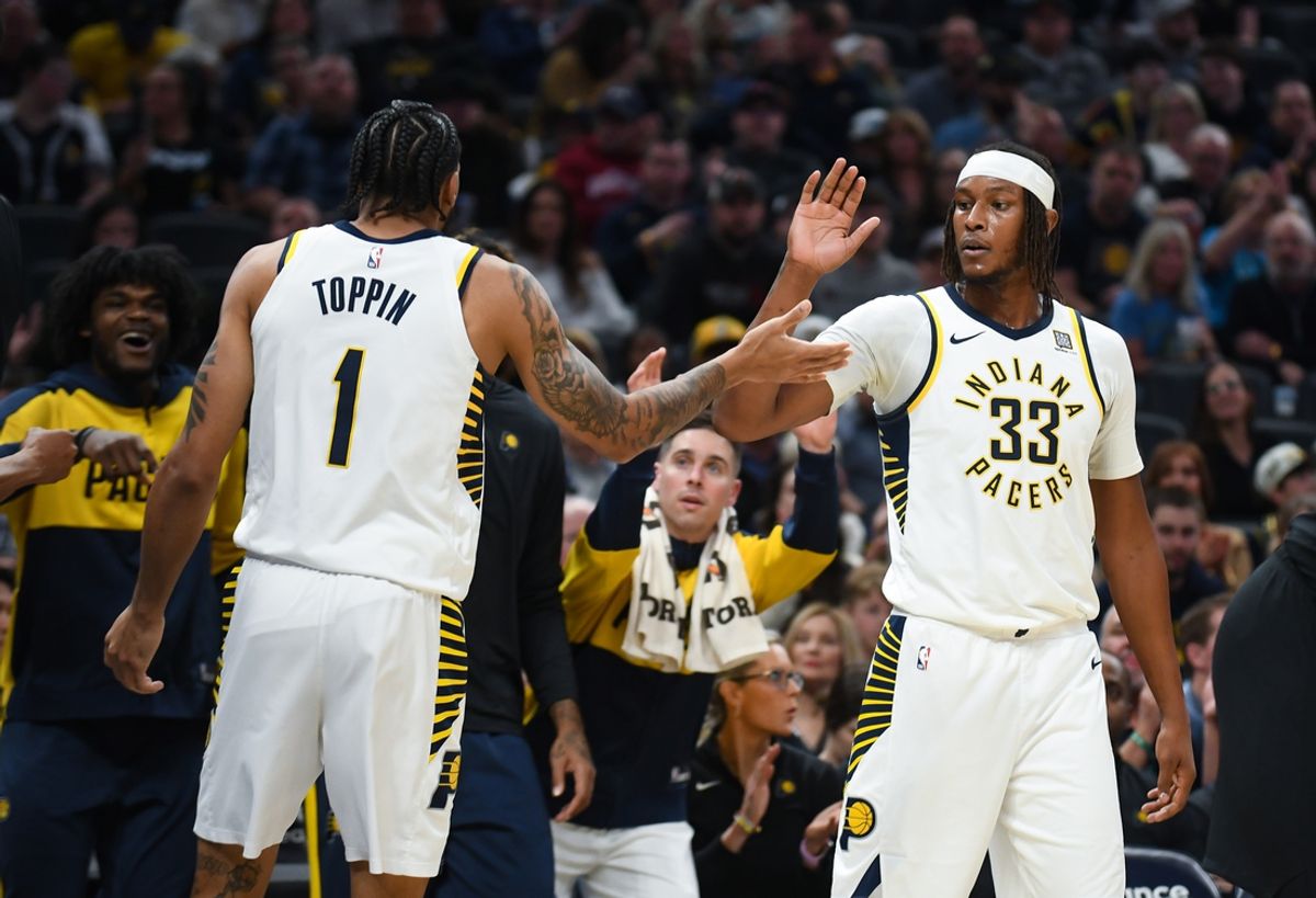 Mar 22, 2025; Indianapolis, Indiana, USA; Indiana Pacers forward Obi Toppin (1) and Indiana Pacers center Myles Turner (33) high-five during the first half against the Brooklyn Nets at Gainbridge Fieldhouse. Mandatory Credit: Robert Goddin-Imagn Images