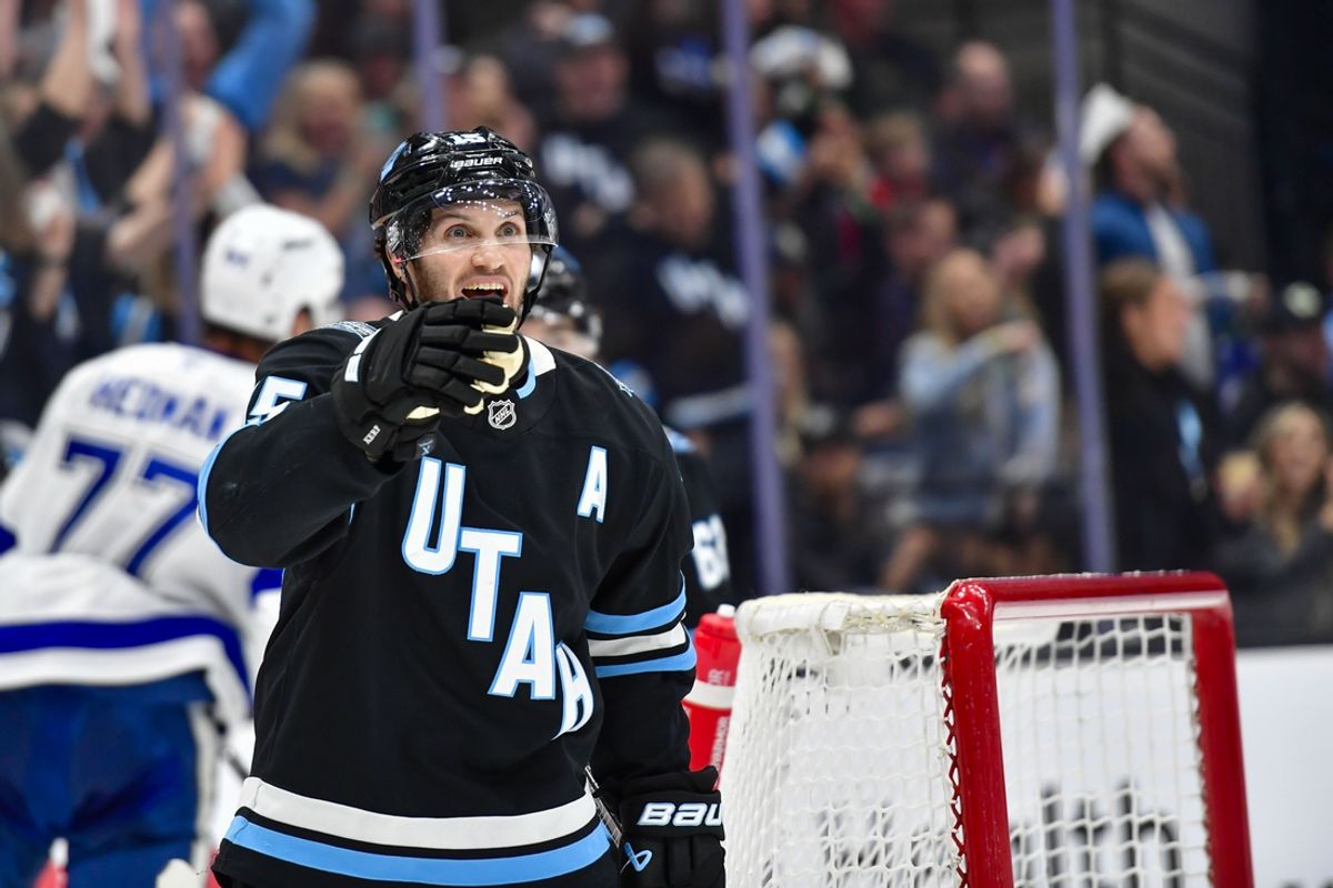 Mar 22, 2025; Salt Lake City, Utah, USA; Utah Hockey Club center Alexander Kerfoot (15) reacts after goal against the Tampa Bay Lightning during second period at the Delta Center. Mandatory Credit: Peter Creveling-Imagn Images