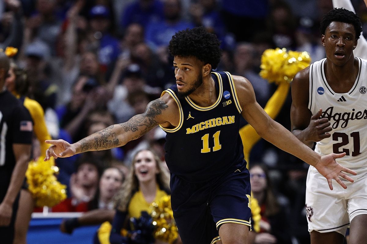Mar 22, 2025; Denver, CO, USA; Michigan Wolverines guard Roddy Gayle Jr. (11) reacts against the Texas A&M Aggies during the second half in the second round of the NCAA Tournament  at Ball Arena. Mandatory Credit: Isaiah J. Downing-Imagn Images