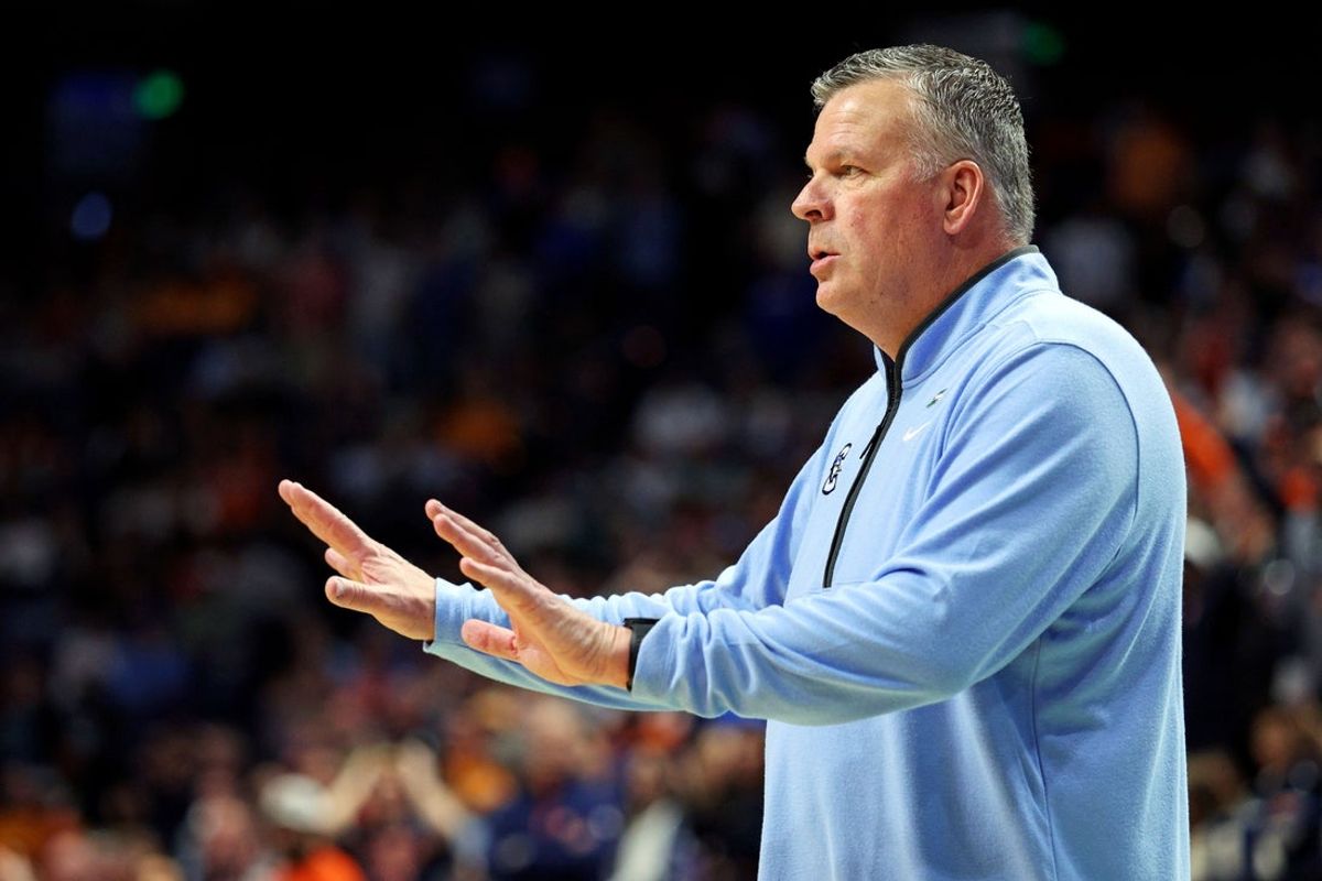 Mar 22, 2025; Lexington, KY, USA;  Creighton Bluejays head coach Greg McDermott reacts during the first half against the Auburn Tigers in the second round to the NCAA Tournament at Rupp Arena. Mandatory Credit: Jordan Prather-Imagn Images