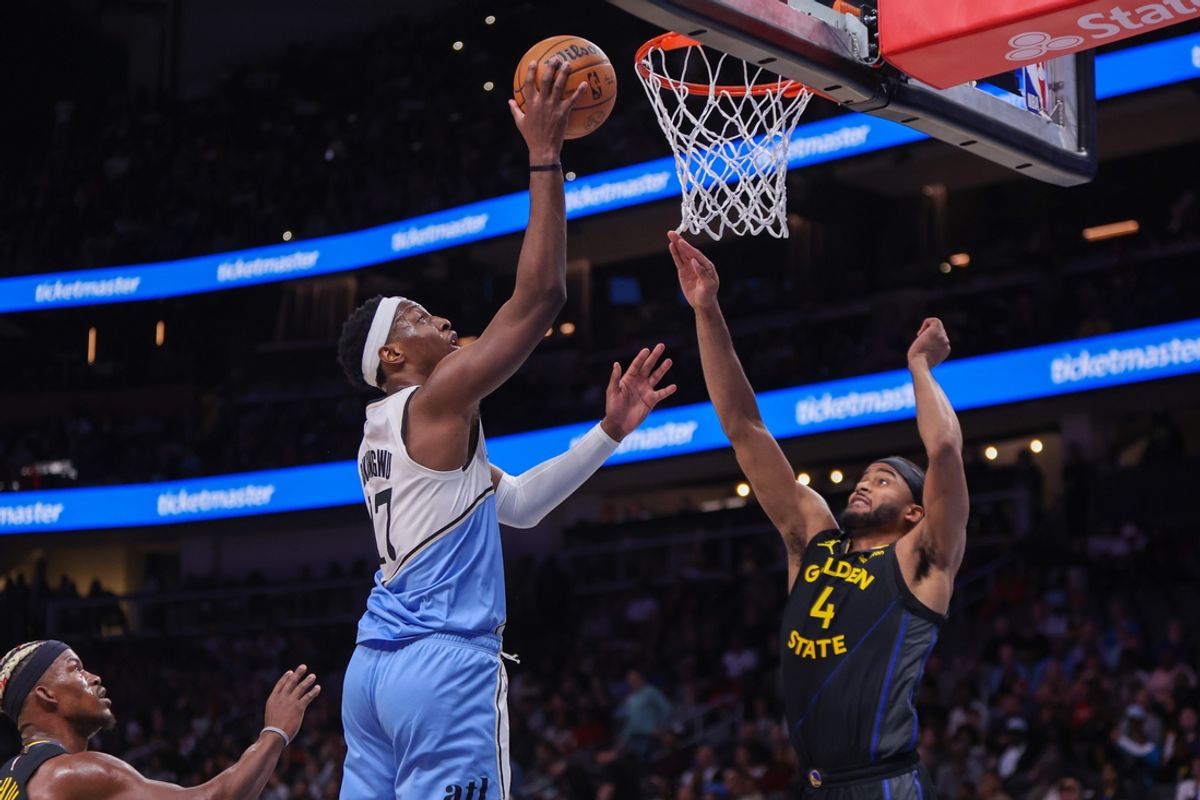 Mar 22, 2025; Atlanta, Georgia, USA; Atlanta Hawks forward Onyeka Okongwu (17) shoots against the Golden State Warriors in the second quarter at State Farm Arena. Mandatory Credit: Brett Davis-Imagn Images