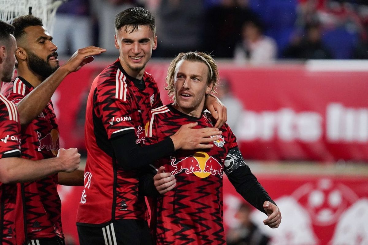 Mar 22, 2025; Harrison, New Jersey, USA; New York Red Bulls midfielder Emil Forsberg (10) celebrates with teammates after scoring on a penalty kick during the first half against Toronto FC at Sports Illustrated Stadium. Mandatory Credit: Lucas Boland-Imagn Images