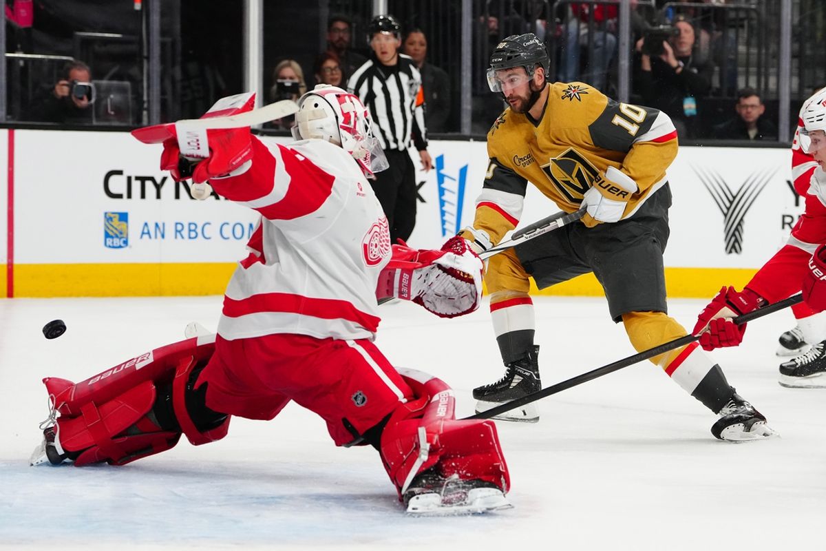 Mar 22, 2025; Las Vegas, Nevada, USA; Vegas Golden Knights center Nicolas Roy (10) scores against Detroit Red Wings goaltender Cam Talbot (39) during the first period at T-Mobile Arena. Mandatory Credit: Stephen R. Sylvanie-Imagn Images