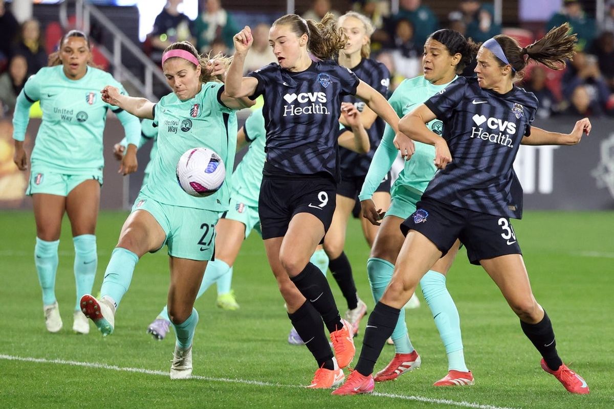 Mar 22, 2025; Washington, District of Columbia, USA; Washington Spirit forward Ashley Hatch (33) kicks the ball during the first half against the Kansas City Current at Audi Field. Mandatory Credit: Daniel Kucin Jr.-Imagn Images