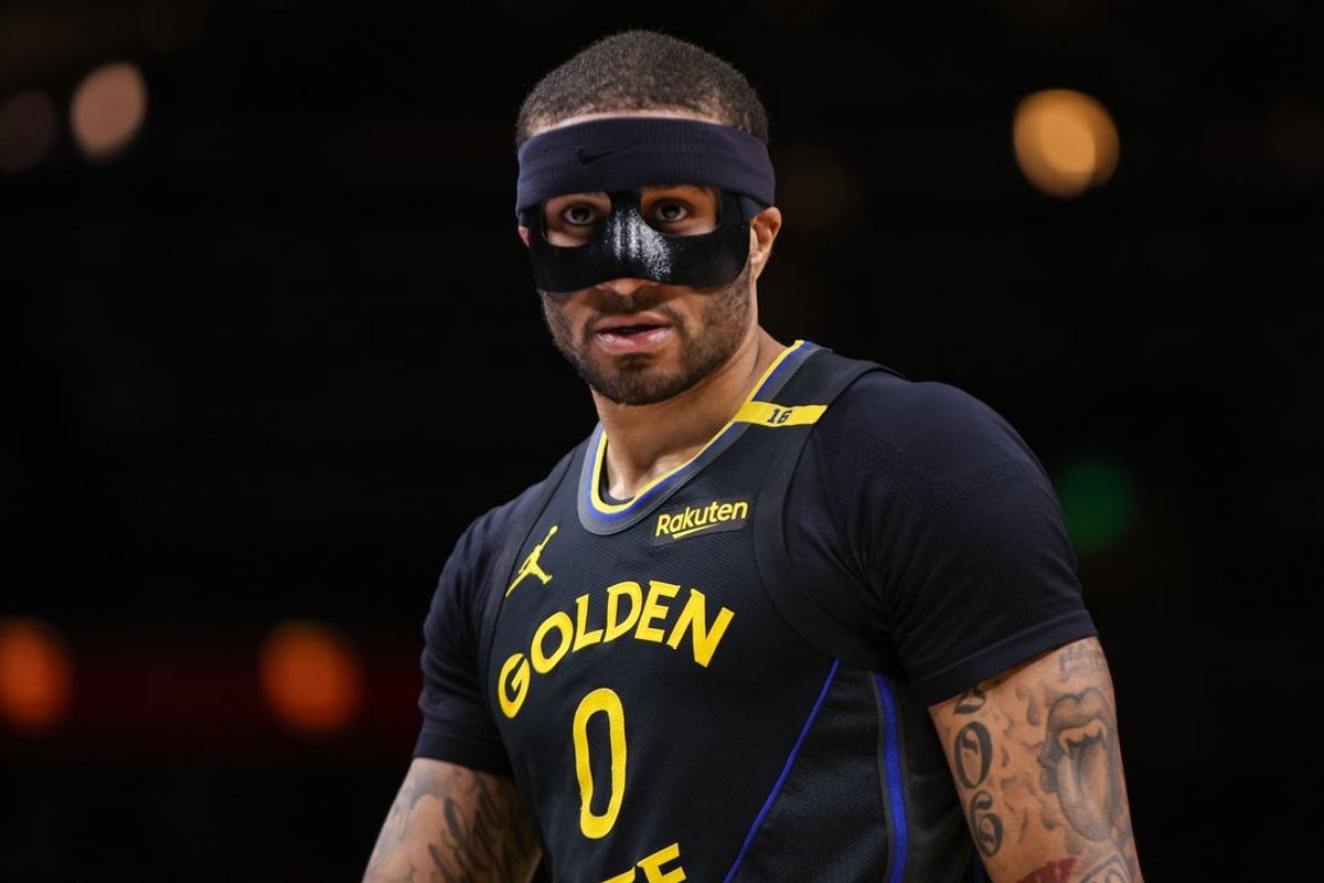 Mar 22, 2025; Atlanta, Georgia, USA; Golden State Warriors guard Gary Payton II (0) in action against the Atlanta Hawks in the fourth quarter at State Farm Arena. Mandatory Credit: Brett Davis-Imagn Images