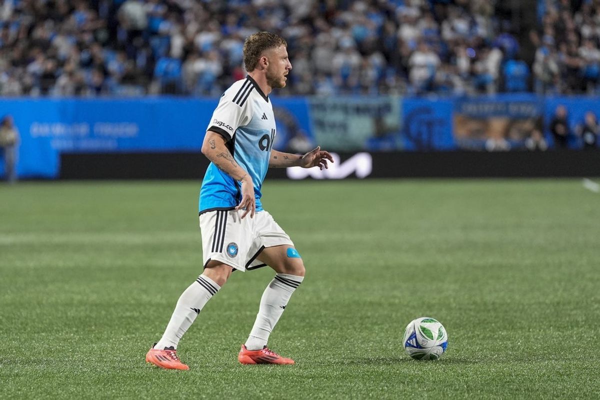 Mar 22, 2025; Charlotte, North Carolina, USA; Charlotte FC midfielder Pep Biel (16) on the dribble against the San Jose Earthquakes during the second half at Bank of America Stadium. Mandatory Credit: Jim Dedmon-Imagn Images