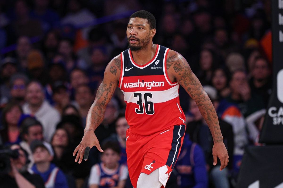 Mar 22, 2025; New York, New York, USA; Washington Wizards guard Marcus Smart (36) reacts after a basket against the New York Knicks during the second half at Madison Square Garden. Mandatory Credit: Vincent Carchietta-Imagn Images