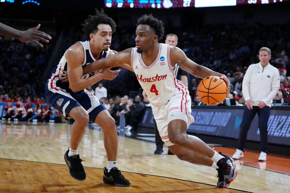 Mar 22, 2025; Wichita, KS, USA; Houston Cougars guard L.J. Cryer (4) drives to the basket against Gonzaga Bulldogs guard Ryan Nembhard (0) during the first half at Intrust Bank Arena. Mandatory Credit: Kirby Lee-Imagn Images