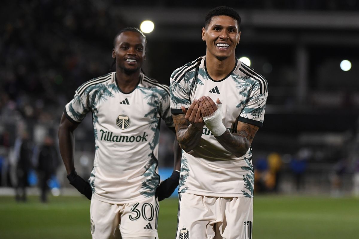 Mar 22, 2025; Commerce City, Colorado, USA; Portland Timbers forward Antony (11) celebrates with midfielder Santiago Moreno (30) after a goal during the second half against the Colorado Rapids at Dick's Sporting Goods Park. Mandatory Credit: Christopher Hanewinckel-Imagn Images