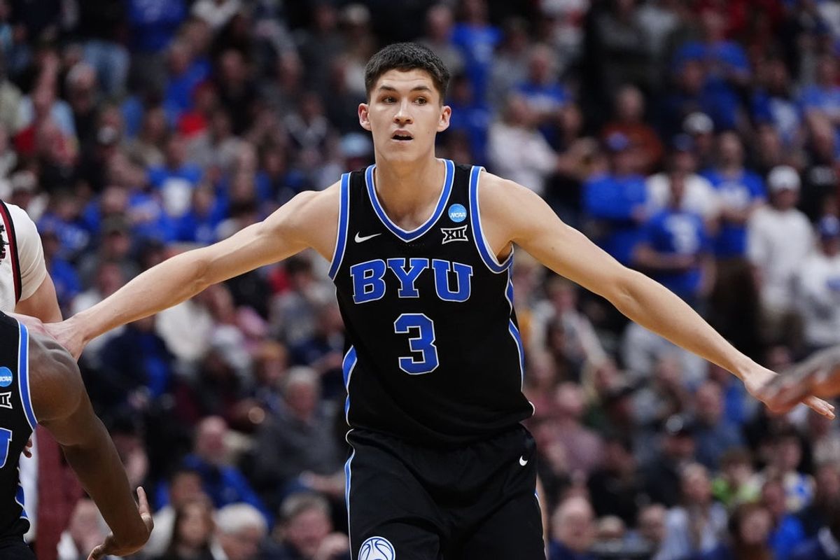 Mar 22, 2025; Denver, CO, USA; Brigham Young Cougars guard Egor Demin (3) reacts against the Wisconsin Badgers during the second half in the second round of the NCAA Tournament  at Ball Arena. Mandatory Credit: Ron Chenoy-Imagn Images