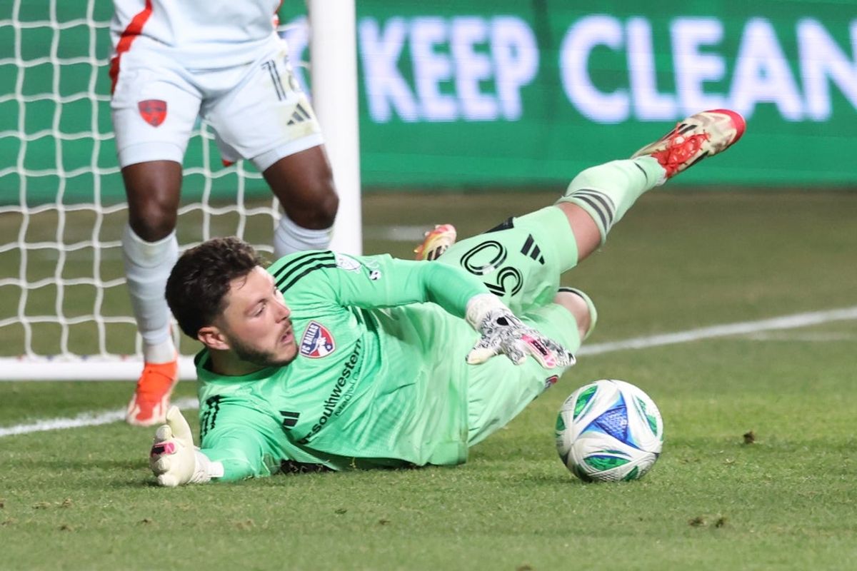 Mar 22, 2025; Sandy, Utah, USA; FC Dallas goalkeeper Michael Collodi (30) makes a save against Real Salt Lake during the second half at America First Field. Mandatory Credit: Rob Gray-Imagn Images