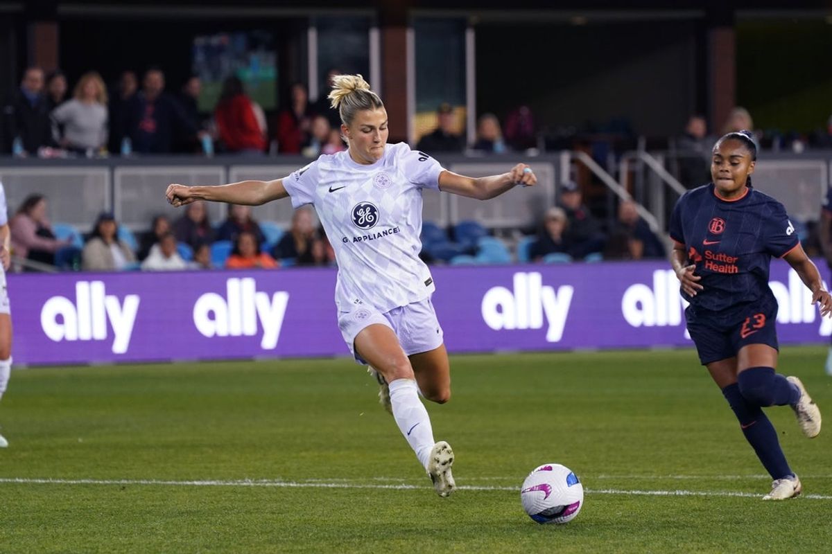 Mar 22, 2025; San Jose, California, USA; Racing Louisville midfielder Kayla Fischer (9) takes a shot on goal while defended by Bay FC defender Kiki Pickett (23) in the first half at PayPal Park. Mandatory Credit: David Gonzales-Imagn Images