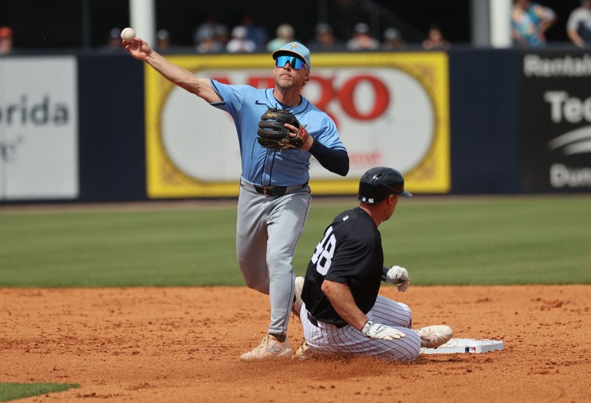 Mar 23, 2025; Tampa, Florida, USA; Tampa Bay Rays shortstop Taylor Walls (6) forces out New York Yankees first baseman Paul Goldschmidt (48) as he throws the ball to first base during the sixth inning at George M. Steinbrenner Field. Mandatory Credit: Kim Klement Neitzel-Imagn Images
