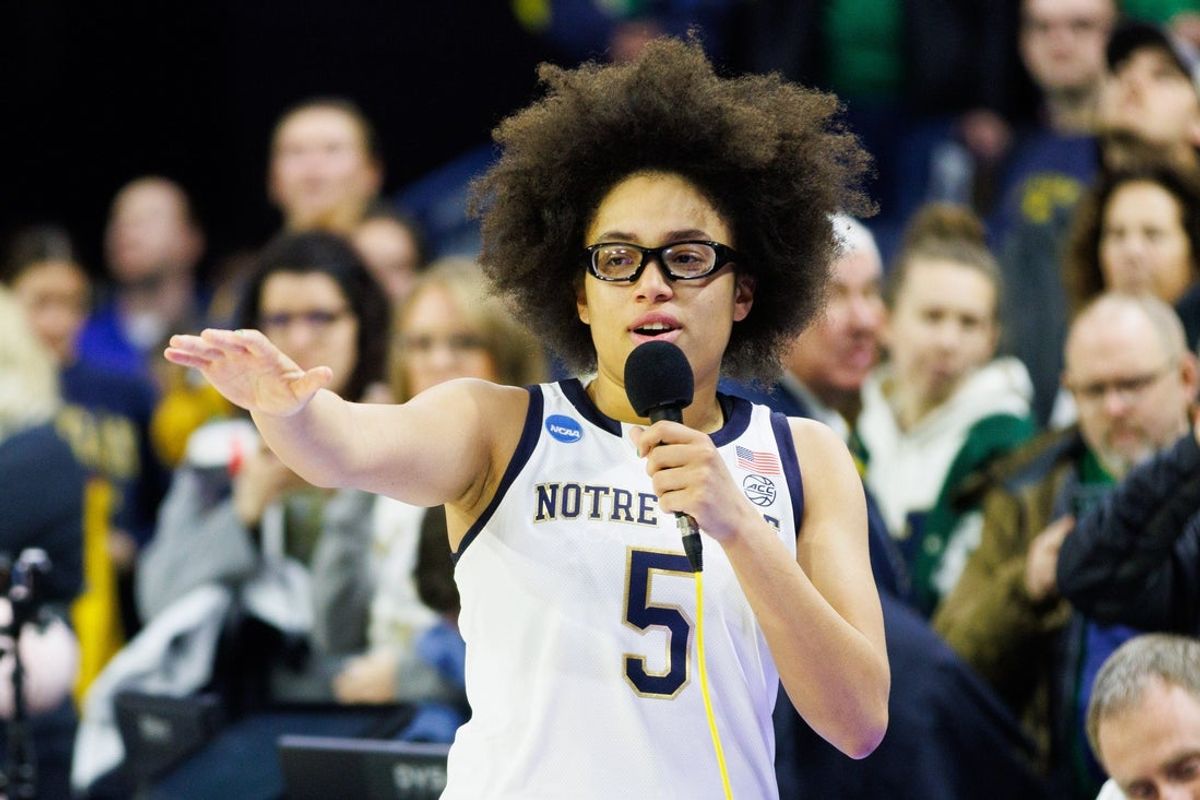 Notre Dame guard Olivia Miles addresses the crowd after winning the second round of the NCAA Women's Basketball Tournament 76-55 against Michigan at Purcell Pavilion on Sunday, March 23, 2025, in South Bend.