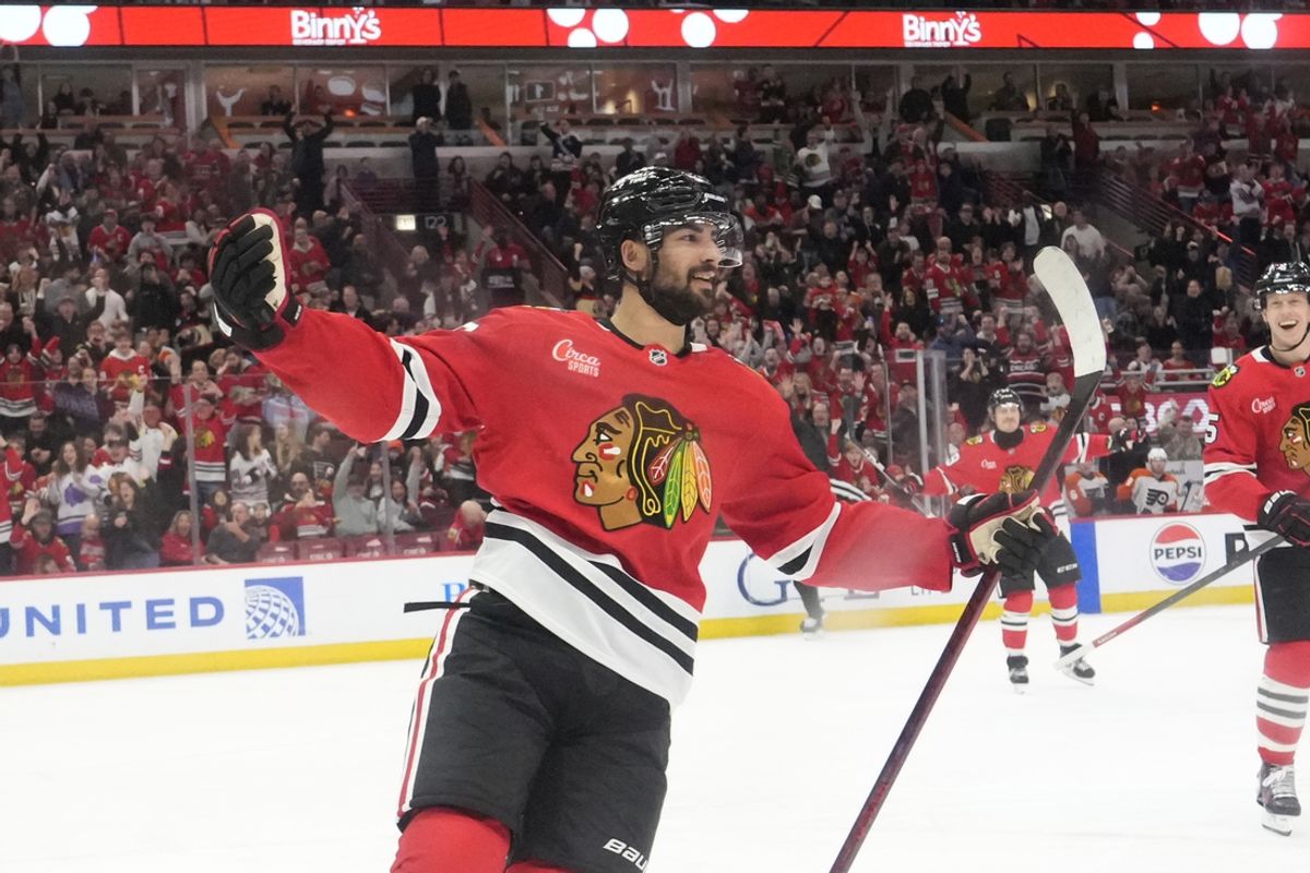 Mar 23, 2025; Chicago, Illinois, USA; Chicago Blackhawks center Joe Veleno (90) celebrates after his goal against the Philadelphia Flyers during the first period at United Center. Mandatory Credit: David Banks-Imagn Images