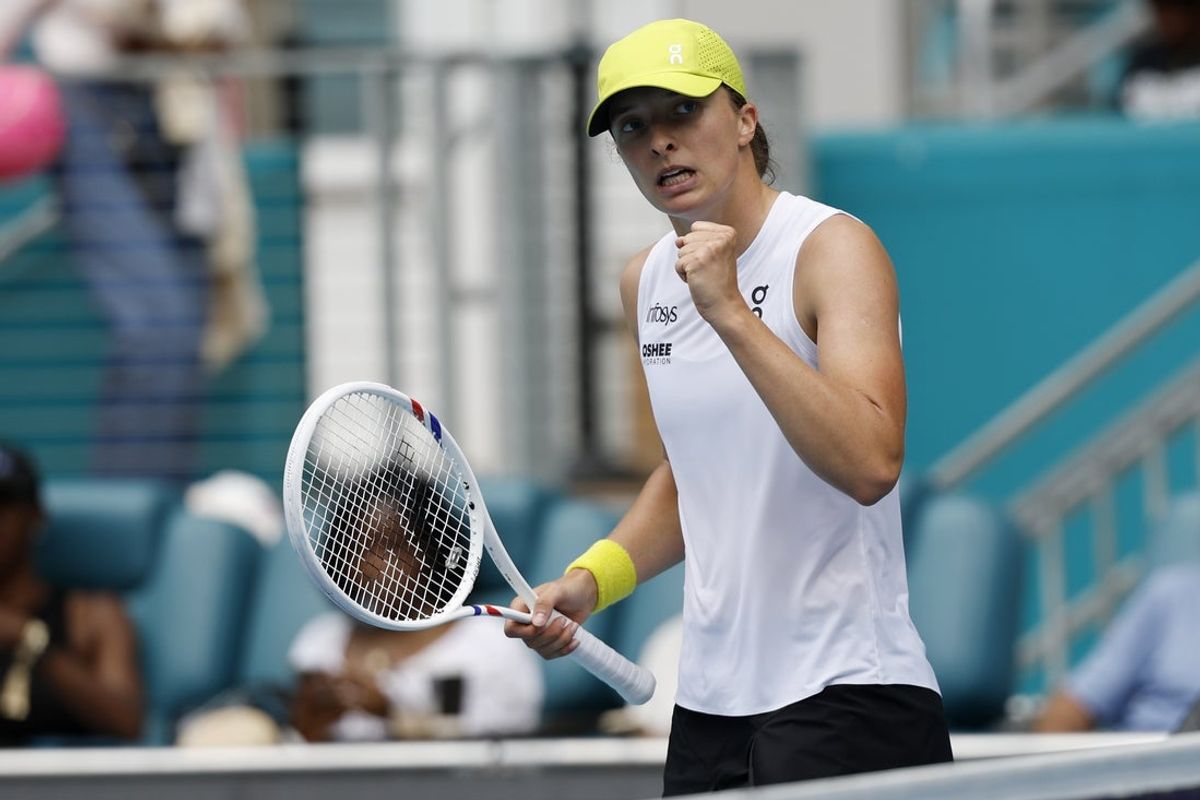 Mar 23, 2025; Miami, FL, USA; Iga Swiatek (POL) celebrates after match point against Elise Mertens (BEL)(not pictured) on day six of the Miami Open at Hard Rock Stadium. Mandatory Credit: Geoff Burke-Imagn Images