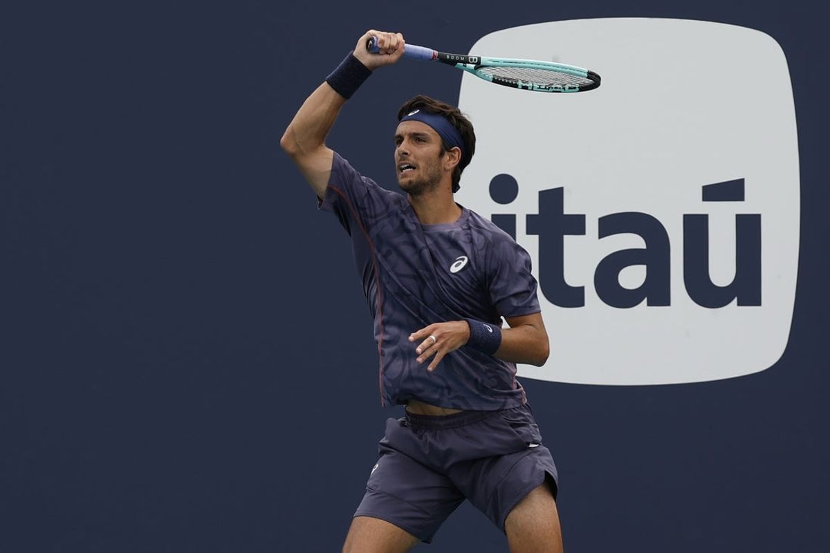 Mar 23, 2025; Miami, FL, USA; Lorenzo Musetti (ITA) hits a forehand against Felix Auger-Aliassime (CAN)(not pictured) on day six of the Miami Open at Hard Rock Stadium. Mandatory Credit: Geoff Burke-Imagn Images