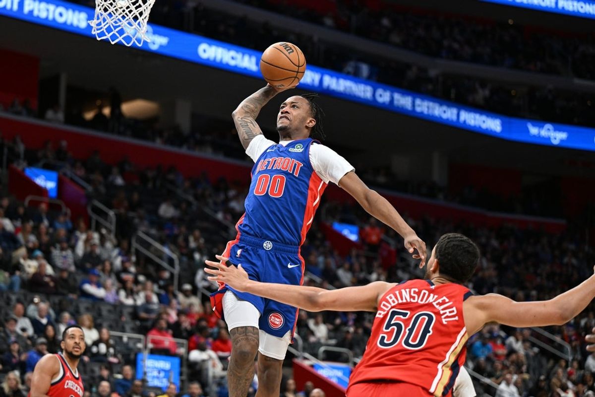 Mar 23, 2025; Detroit, Michigan, USA;  Detroit Pistons forward Ronald Holland II (00) dunks the ball against the New Orleans Pelicans in the third quarter at Little Caesars Arena. Mandatory Credit: Lon Horwedel-Imagn Images