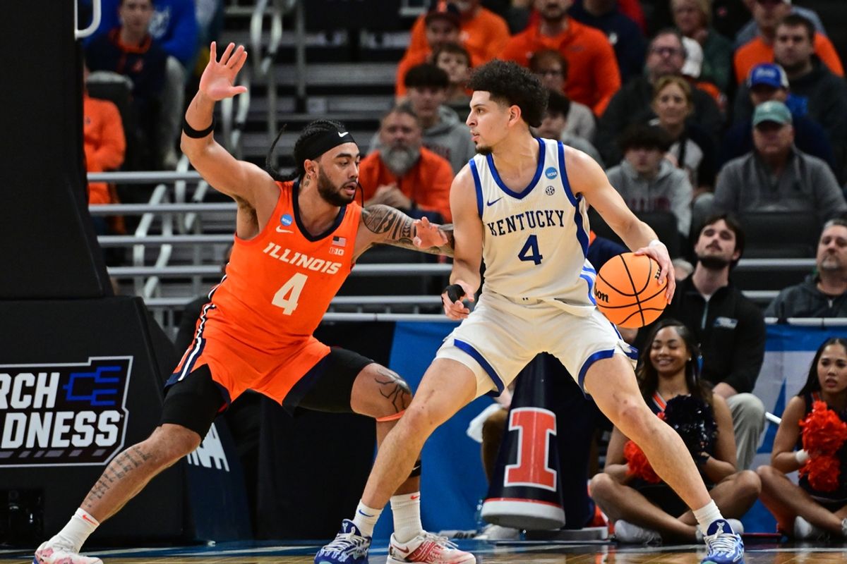 Mar 23, 2025; Milwaukee, WI, USA;  Kentucky Wildcats guard Koby Brea (4) dribbles against Illinois Fighting Illini guard Kylan Boswell (4) during the first half in the second round of the NCAA Tournament at Fiserv Forum. Mandatory Credit: Benny Sieu-Imagn Images