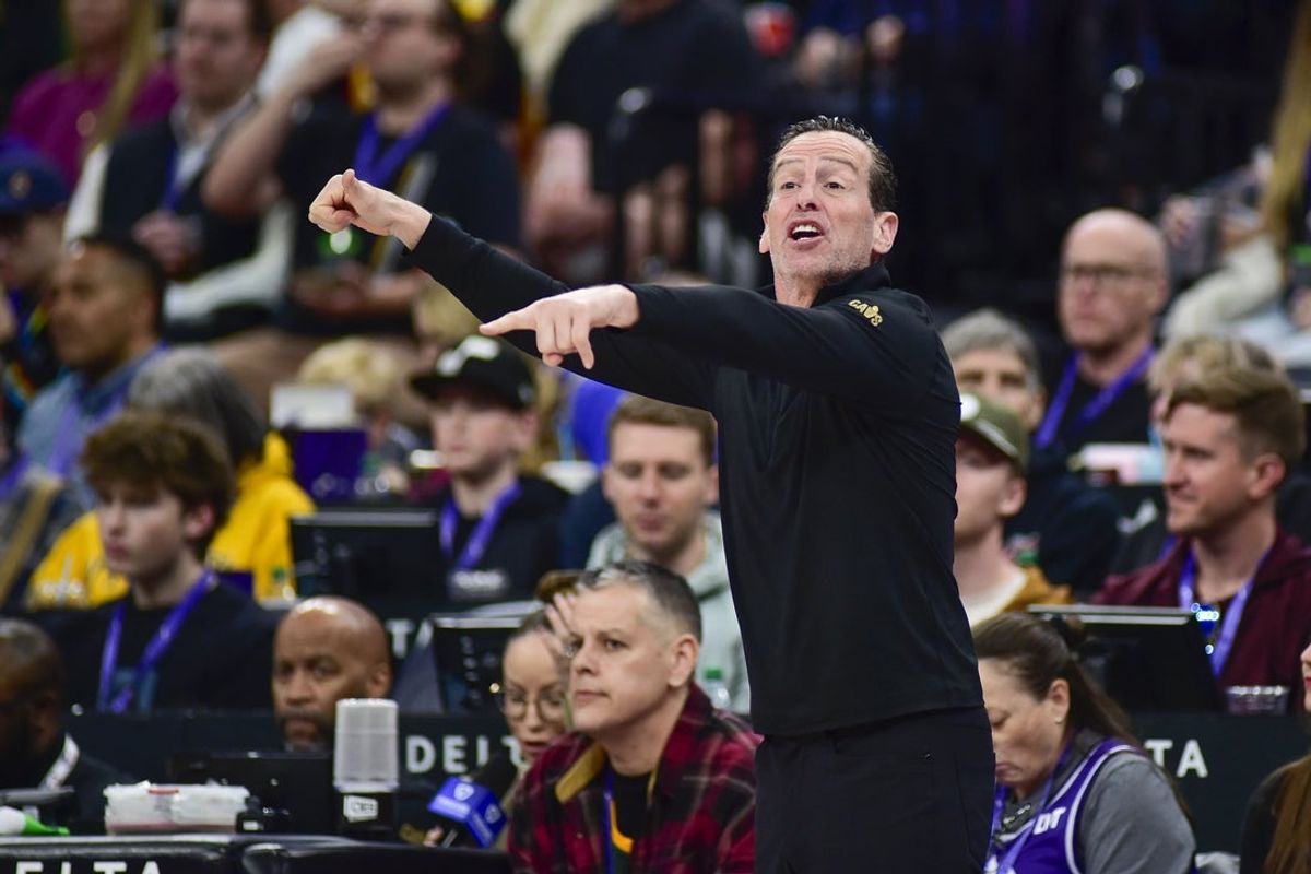 Mar 23, 2025; Salt Lake City, Utah, USA; Cleveland Cavaliers head coach Kenny Atkinson instructs the team against the Utah Jazz during the second half at Delta Center. Mandatory Credit: Peter Creveling-Imagn Images