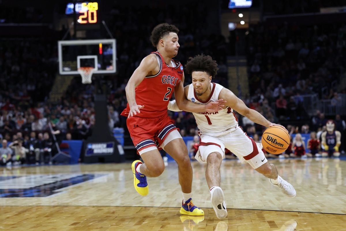 Mar 23, 2025; Cleveland, OH, USA; Alabama Crimson Tide guard Mark Sears (1) dribbles defended by St. Mary's Gaels guard Jordan Ross (2) in the second half during the NCAA Tournament Second Round at Rocket Arena. Mandatory Credit: Rick Osentoski-Imagn Images