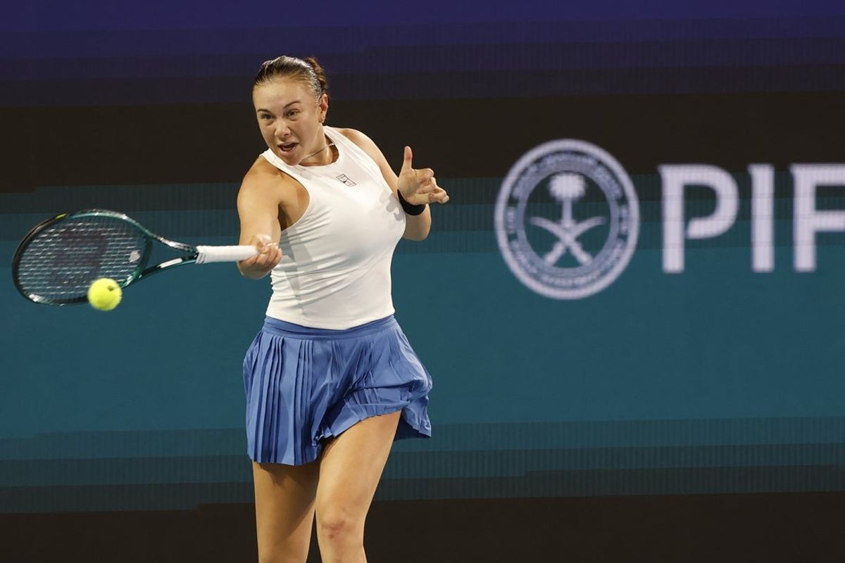 Mar 23, 2025; Miami, FL, USA; Amanda Anisimova (USA) hits a forehand against Mirra Andreeva(not pictured) on day six of the Miami Open at Hard Rock Stadium. Mandatory Credit: Geoff Burke-Imagn Images