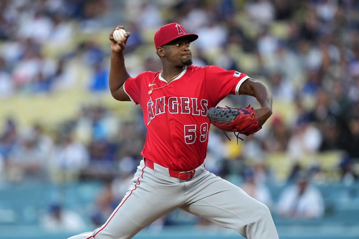 Mar 23, 2025; Los Angeles, California, USA; Los Angeles Angels pitcher Jose Soriano (59) throws in the sixth inning against the Los Angeles Dodgers at Dodger Stadium. Mandatory Credit: Kirby Lee-Imagn Images