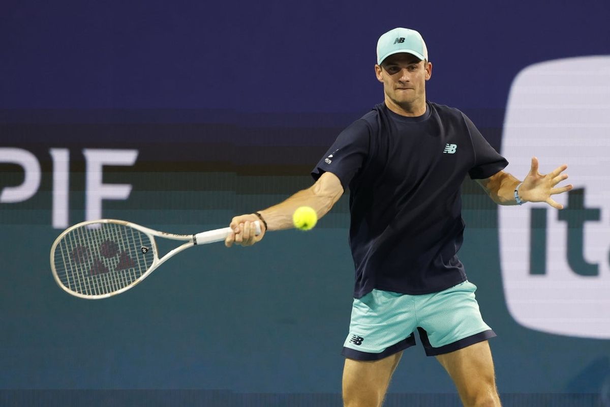 Mar 23, 2025; Miami, FL, USA; Tommy Paul (USA) hits a forehand against Francisco Cerundolo (ARG)(not pictured) on day six of the Miami Open at Hard Rock Stadium. Mandatory Credit: Geoff Burke-Imagn Images