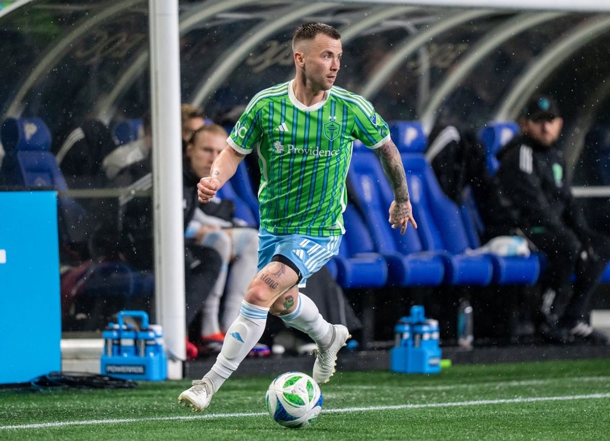 Feb 22, 2025; Seattle, Washington, USA;  Seattle Sounders midfielder Albert Rusnak (11) dribbles the ball against Charlotte FC at Lumen Field. Mandatory Credit: Stephen Brashear-Imagn Images