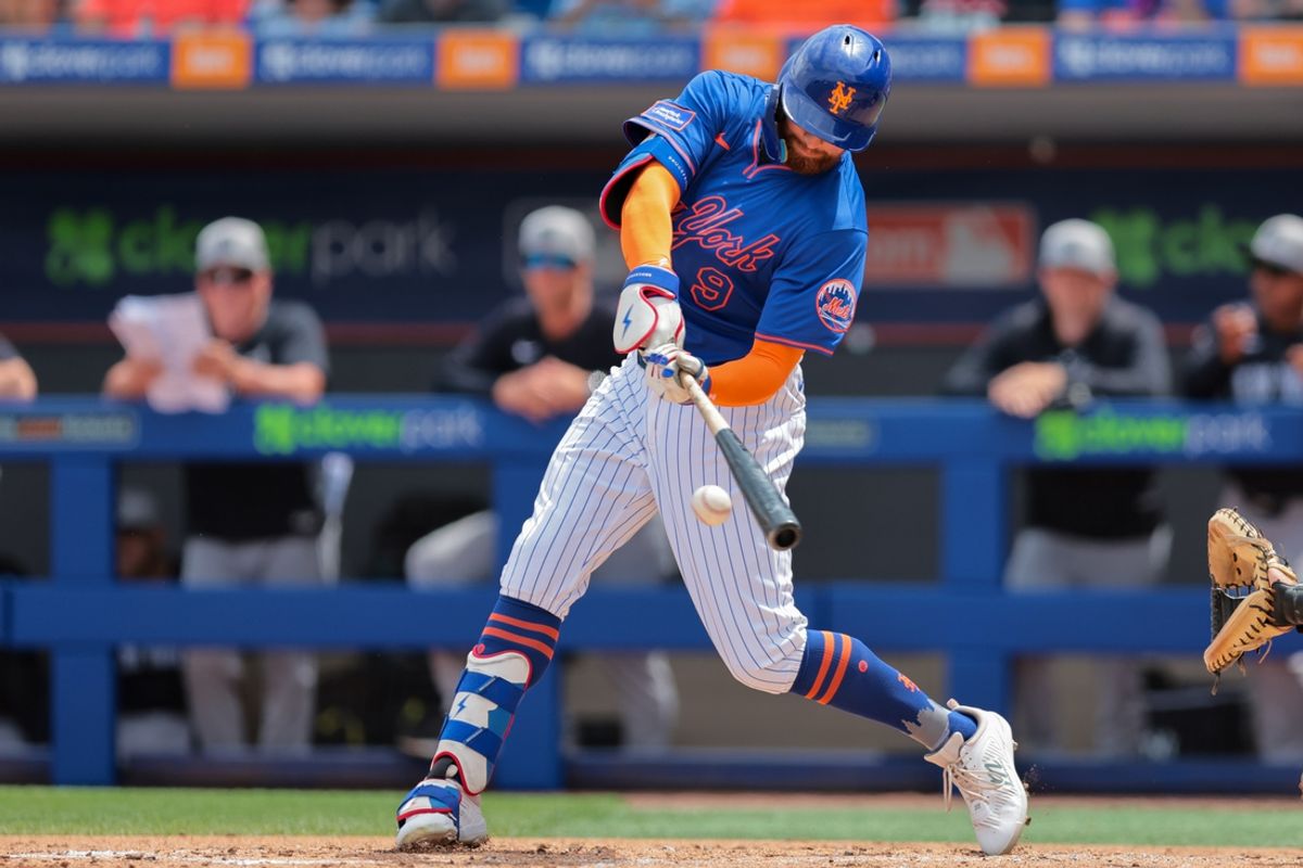 Mar 24, 2025; Port St. Lucie, Florida, USA; New York Mets left fielder Brandon Nimmo (9) hits a single against the New York Yankees during the first inning at Clover Park. Mandatory Credit: Sam Navarro-Imagn Images