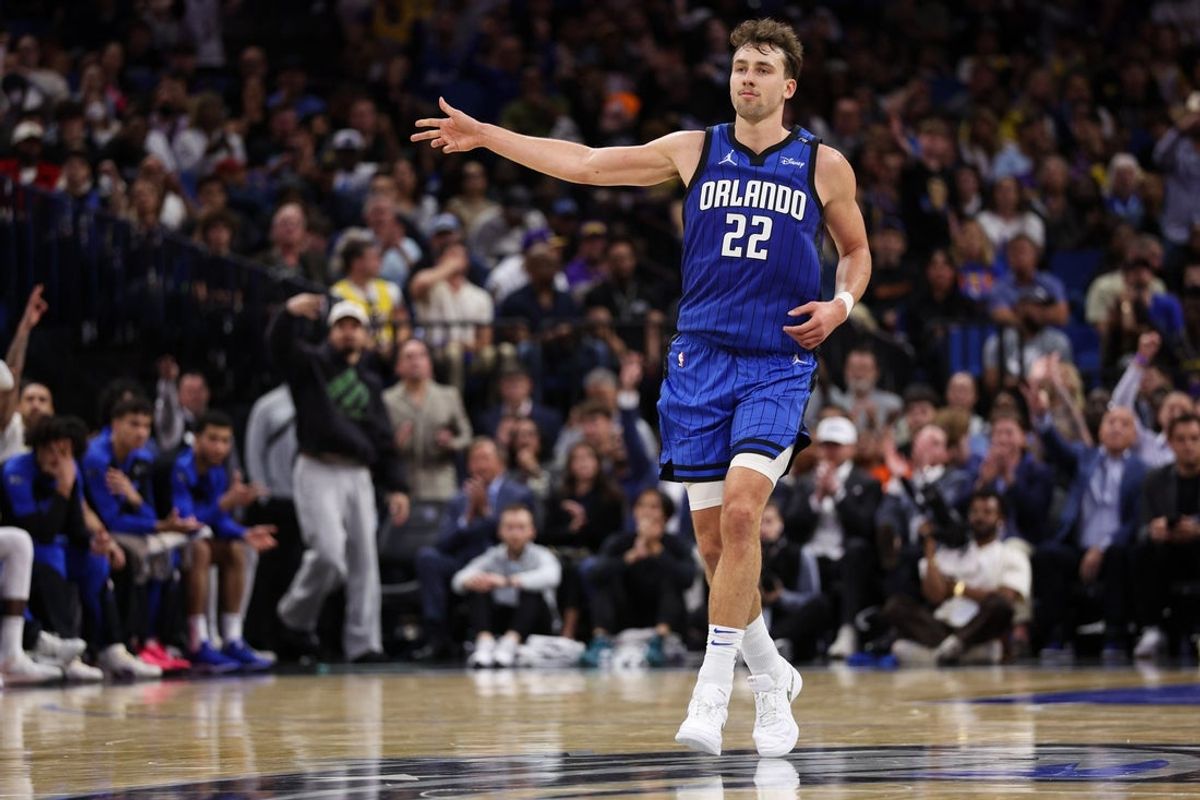 Mar 24, 2025; Orlando, Florida, USA; Orlando Magic forward Franz Wagner (22) celebrates after making a three point shot against the Los Angeles Lakers in the fourth quarter at Kia Center. Mandatory Credit: Nathan Ray Seebeck-Imagn Images