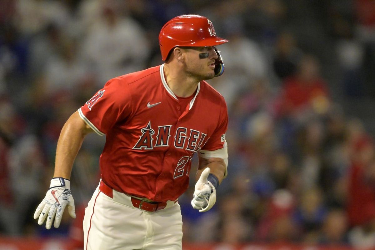 Mar 24, 2025; Anaheim, California, USA; Los Angeles Angels center fielder Mike Trout (27) rounds the bases on a solo home run in the sixth inning against the Los Angeles Dodgers at Angel Stadium. Mandatory Credit: Jayne Kamin-Oncea-Imagn Images