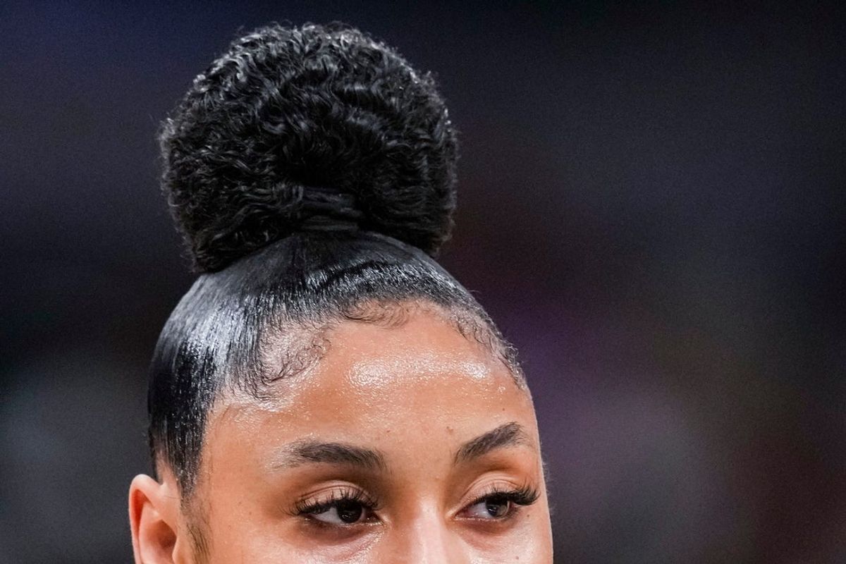 USC Trojans guard JuJu Watkins (12) watches a free throw Saturday, March 8, 2025, in a semifinals game at the 2025 TIAA Big Ten Women's Basketball Tournament between the Iowa Hawkeyes and the Ohio State Buckeyes at Gainbridge Fieldhouse in Indianapolis.