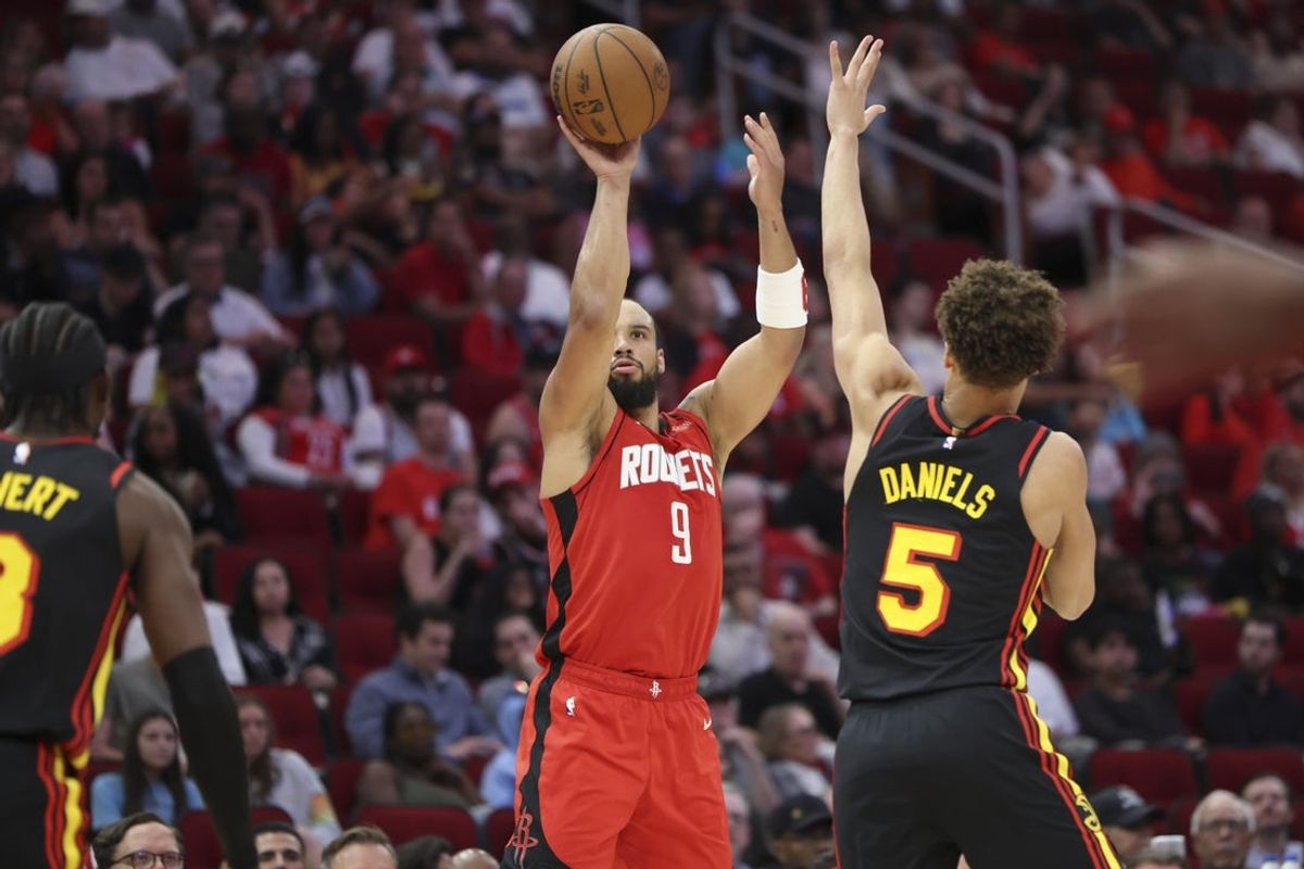Mar 25, 2025; Houston, Texas, USA; Houston Rockets forward Dillon Brooks (9) shoots the ball as Atlanta Hawks guard Dyson Daniels (5) defends during the second quarter at Toyota Center. Mandatory Credit: Troy Taormina-Imagn Images