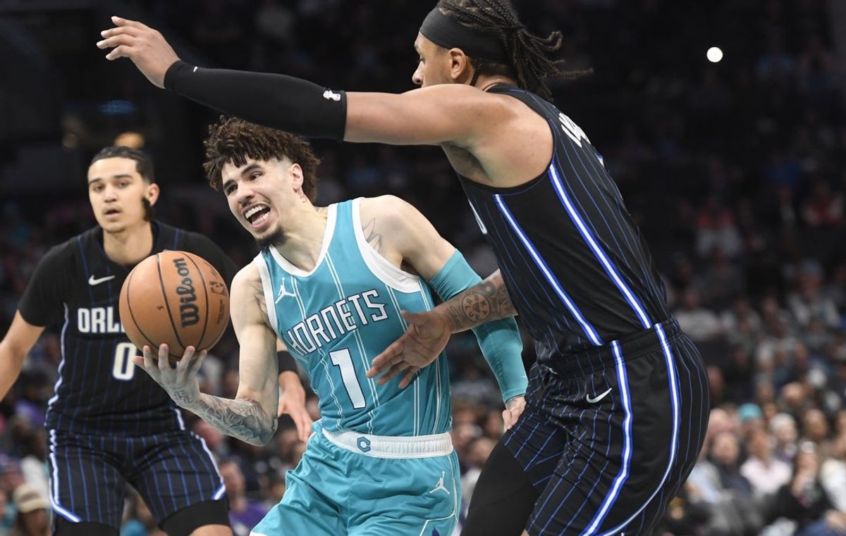 Mar 25, 2025; Charlotte, North Carolina, USA;  Charlotte Hornets guard LaMelo Ball (1) drives in during the second half against the Orlando Magic at the Spectrum Center. Mandatory Credit: Sam Sharpe-Imagn Images
