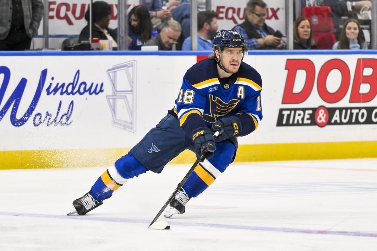 Mar 25, 2025; St. Louis, Missouri, USA;  St. Louis Blues center Robert Thomas (18) controls the puck against the Montreal Canadiens during the second period at Enterprise Center. Mandatory Credit: Jeff Curry-Imagn Images