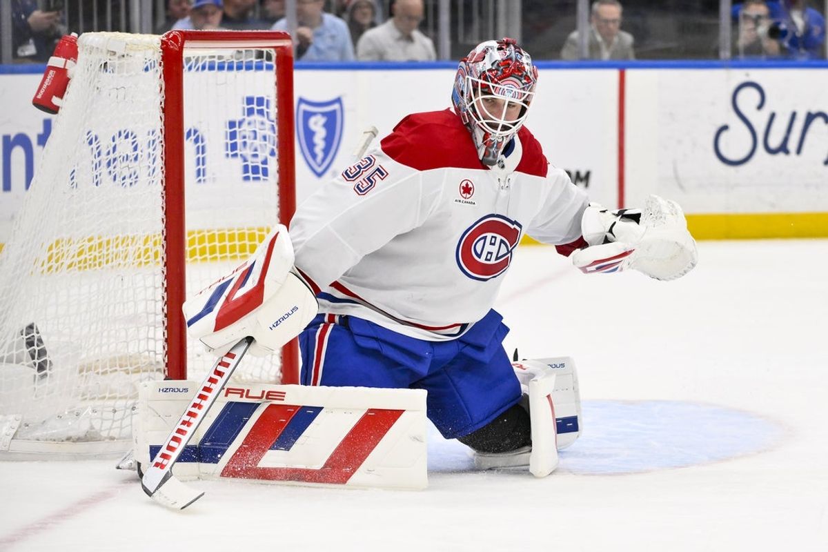 Mar 25, 2025; St. Louis, Missouri, USA;  Montreal Canadiens goaltender Sam Montembeault (35) defends the net against the St. Louis Blues during the second period at Enterprise Center. Mandatory Credit: Jeff Curry-Imagn Images