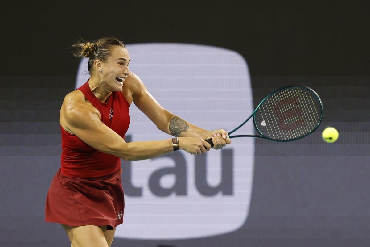 Mar 25, 2025; Miami, FL, USA; Aryna Sabalenka hits a backhand against Zheng Qinwen (CHN)(not pictured) on day eight of the Miami Open at Hard Rock Stadium. Mandatory Credit: Geoff Burke-Imagn Images
