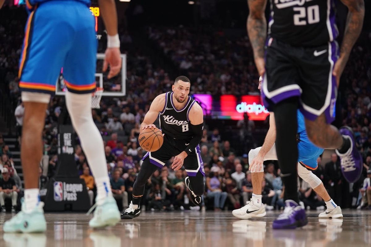 Mar 25, 2025; Sacramento, California, USA; Sacramento Kings guard Zach LaVine (8) dribbles the ball against the Oklahoma City Thunder in the second quarter at the Golden 1 Center. Mandatory Credit: Cary Edmondson-Imagn Images