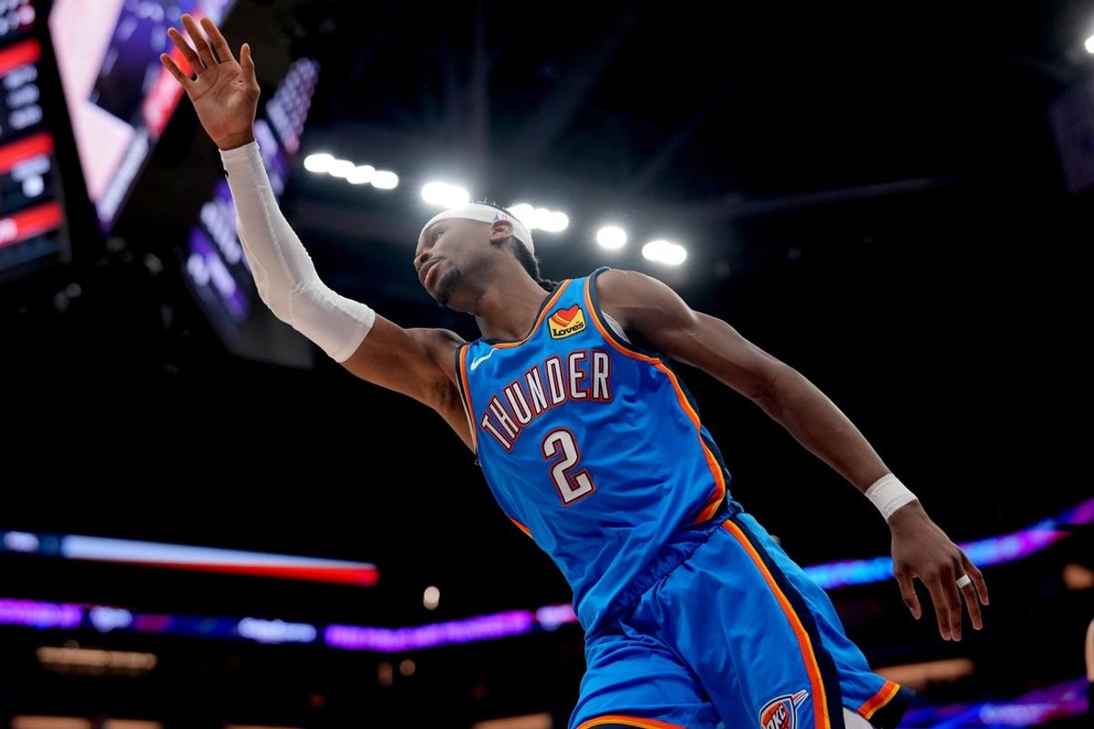 Mar 25, 2025; Sacramento, California, USA; Oklahoma City Thunder guard Shai Gilgeous-Alexander (2) reacts after making a layup against the Sacramento Kings in the fourth quarter at the Golden 1 Center. Mandatory Credit: Cary Edmondson-Imagn Images