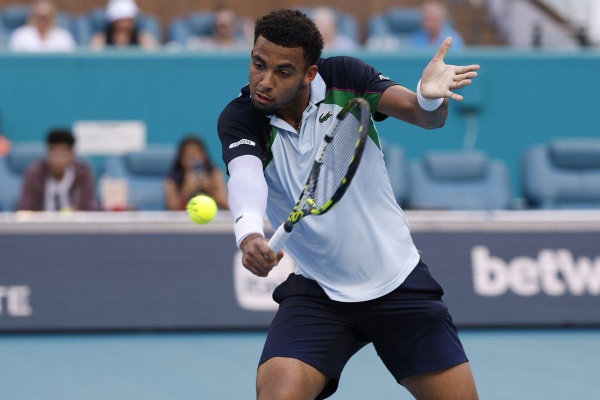 Mar 26, 2025; Miami, FL, USA; Arthur Fils (FRA) hits a volley against Alexander Zverev (GER)(not pictured) on day nine of the Miami Open at Hard Rock Stadium. Mandatory Credit: Geoff Burke-Imagn Images