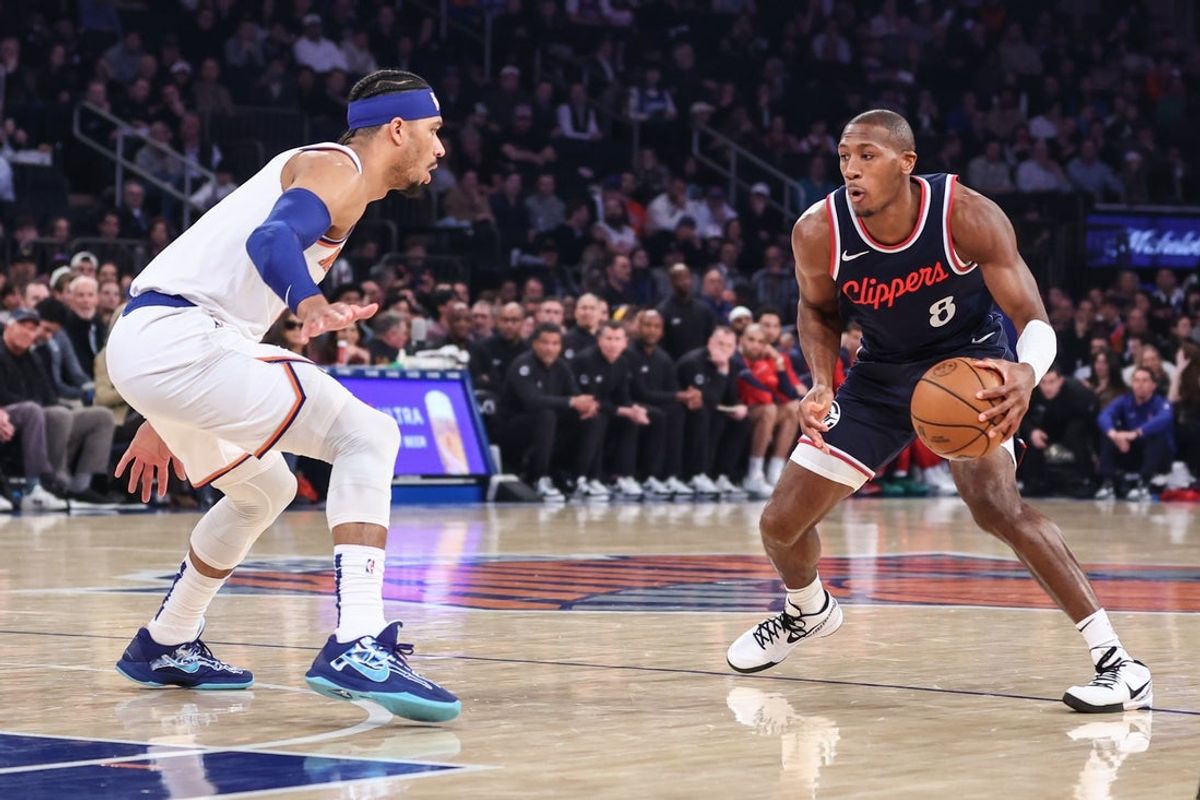 Mar 26, 2025; New York, New York, USA;  LA Clippers guard Trentyn Flowers (9) looks to drive past New York Knicks guard Josh Hart (3) in the first quarter at Madison Square Garden. Mandatory Credit: Wendell Cruz-Imagn Images