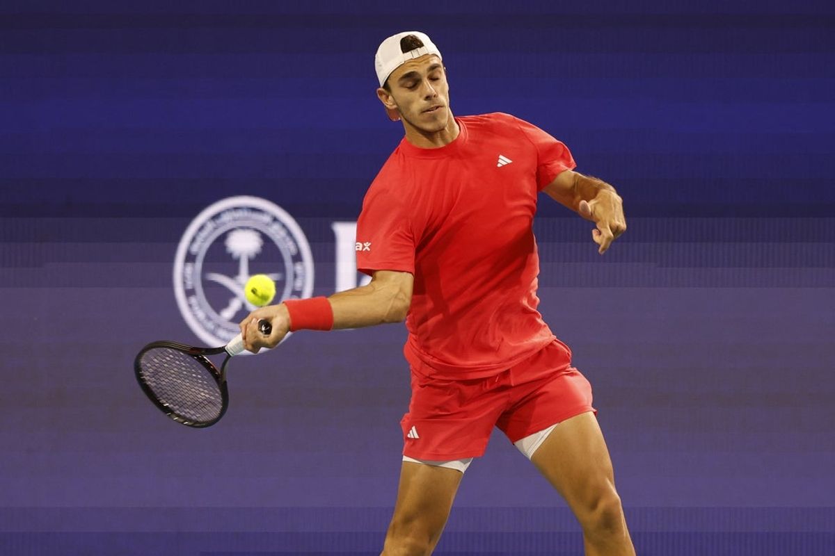 Mar 26, 2025; Miami, FL, USA; Francisco Cerundolo (ARG) hits a forehand against Grigor Dimitrov (BUL)(not pictured) on day nine of the Miami Open at Hard Rock Stadium. Mandatory Credit: Geoff Burke-Imagn Images