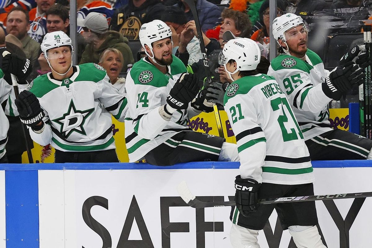 Mar 26, 2025; Edmonton, Alberta, CAN; The Dallas Stars celebrate a goal by Dallas Stars forward Jason Robertson (21) after scoring three goals during the second period against the Edmonton Oilers at Rogers Place. Mandatory Credit: Perry Nelson-Imagn Images