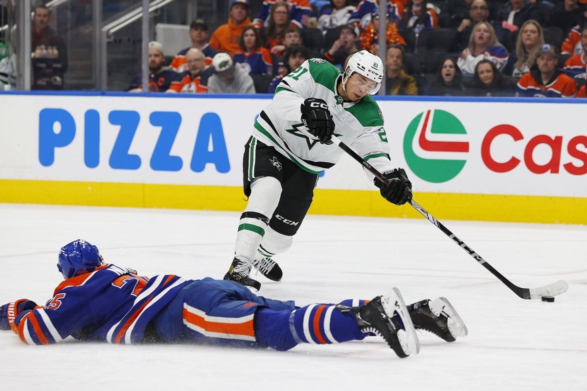 Mar 26, 2025; Edmonton, Alberta, CAN; Edmonton Oilers defensemen Darnell Nurse (25) tries to block shot by Dallas Stars forward Jason Robertson (21) that got by goaltender Stuart Skinner (not pictured) during the second period at Rogers Place. Mandatory Credit: Perry Nelson-Imagn Images