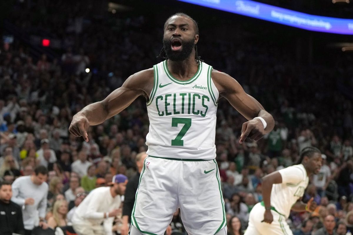 Mar 26, 2025; Phoenix, Arizona, USA; Boston Celtics guard Jaylen Brown (7) reacts after scoring against the Phoenix Suns during the second half at Footprint Center. Mandatory Credit: Rick Scuteri-Imagn Images