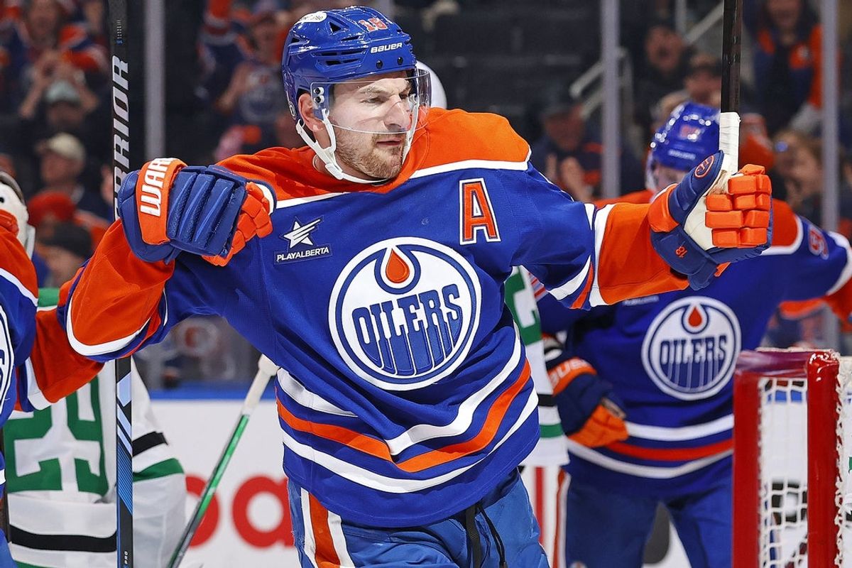 Mar 26, 2025; Edmonton, Alberta, CAN; Edmonton Oilers forward Zach Hyman (18) celebrates after scoring a goal against the Dallas Stars during the third period at Rogers Place. Mandatory Credit: Perry Nelson-Imagn Images