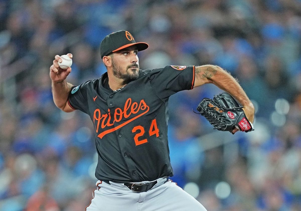 Mar 27, 2025; Toronto, Ontario, CAN; Baltimore Orioles starting pitcher Zach Eflin (24) throws a pitch against the Toronto Blue Jays during the second inning at Rogers Centre. Mandatory Credit: Nick Turchiaro-Imagn Images