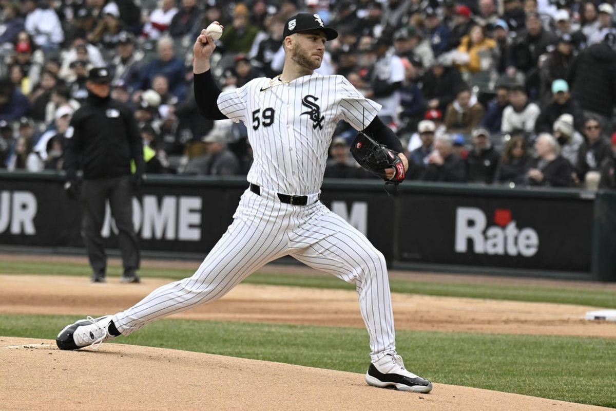 Mar 27, 2025; Chicago, Illinois, USA;  Chicago White Sox pitcher Sean Burke (59) delivers against the Los Angeles Angels during the first inning at Guaranteed Rate Field. Mandatory Credit: Matt Marton-Imagn Images